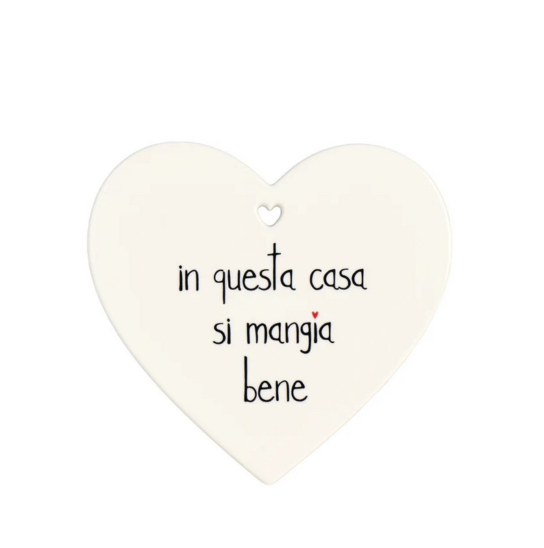 Sottopentola in gres a forma di cuore decorato con scritta “In questa casa si mangia bene”